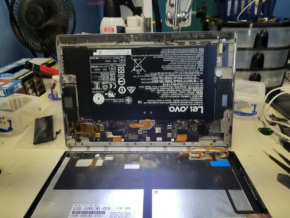 Lenovo laptop opened for an internal battery replacement